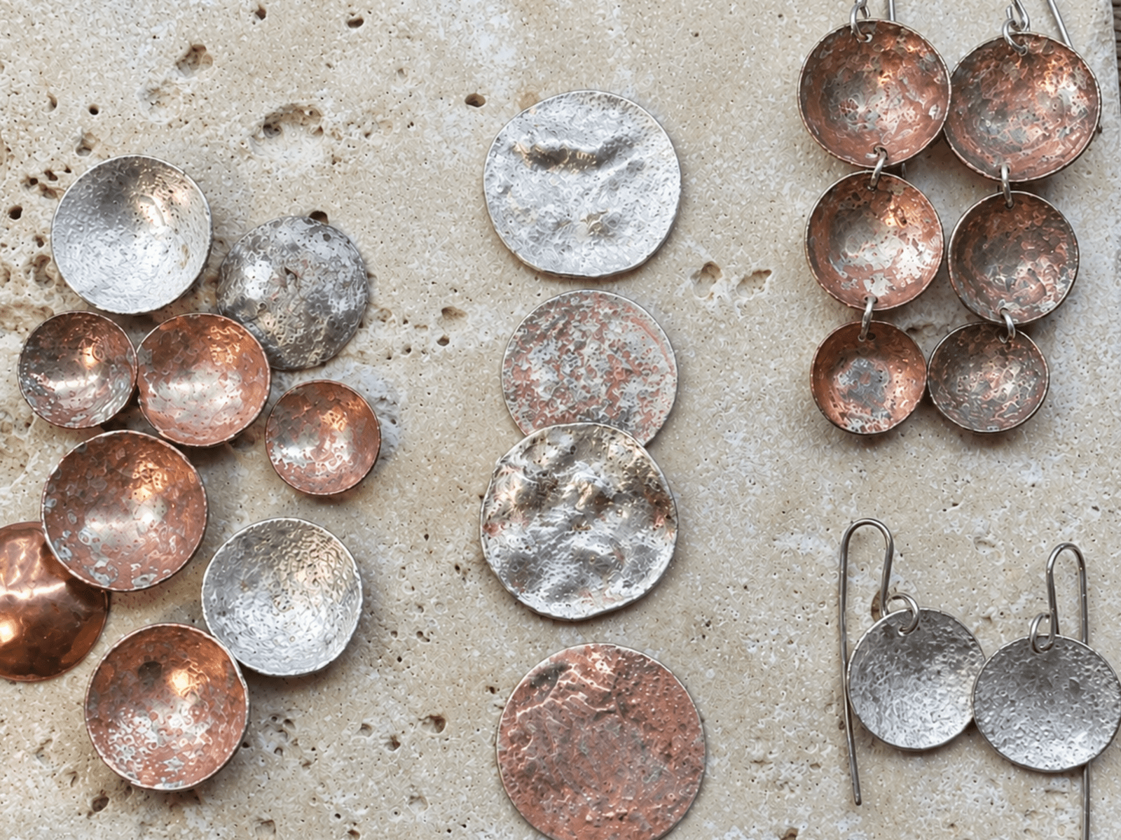 A Selection of Silver Orb Jewelry Pieces and Materials